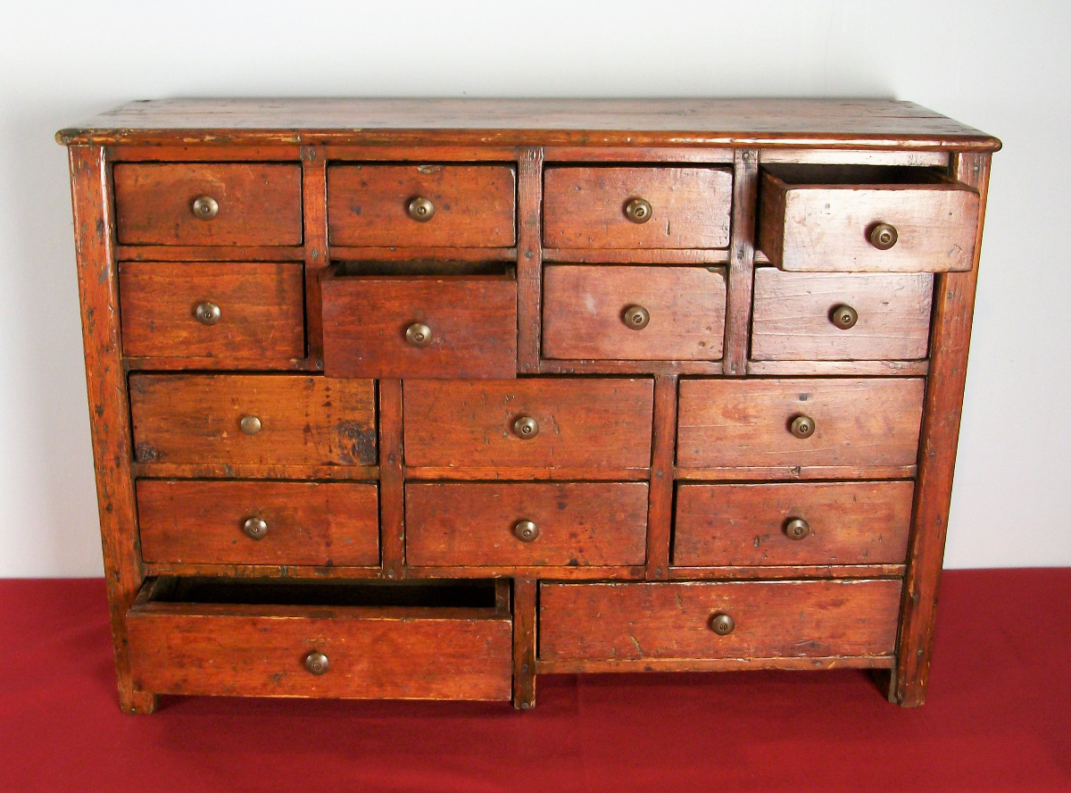 A Collector's cabinet of 16 Drawers (dated 1910)